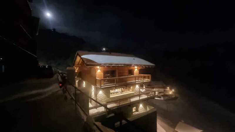 a view of Chalet Cervinia, luxury solo ski chalet at night